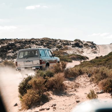 old landcruiser driving remotely in the bush