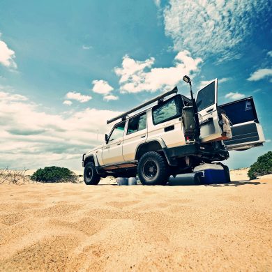 v8 landcruiser in the middle of the desert